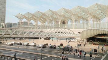 Passengers outside Lisbon Oriente station building