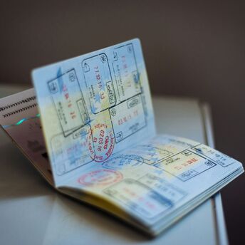 Passport pages with multiple entry and exit stamps