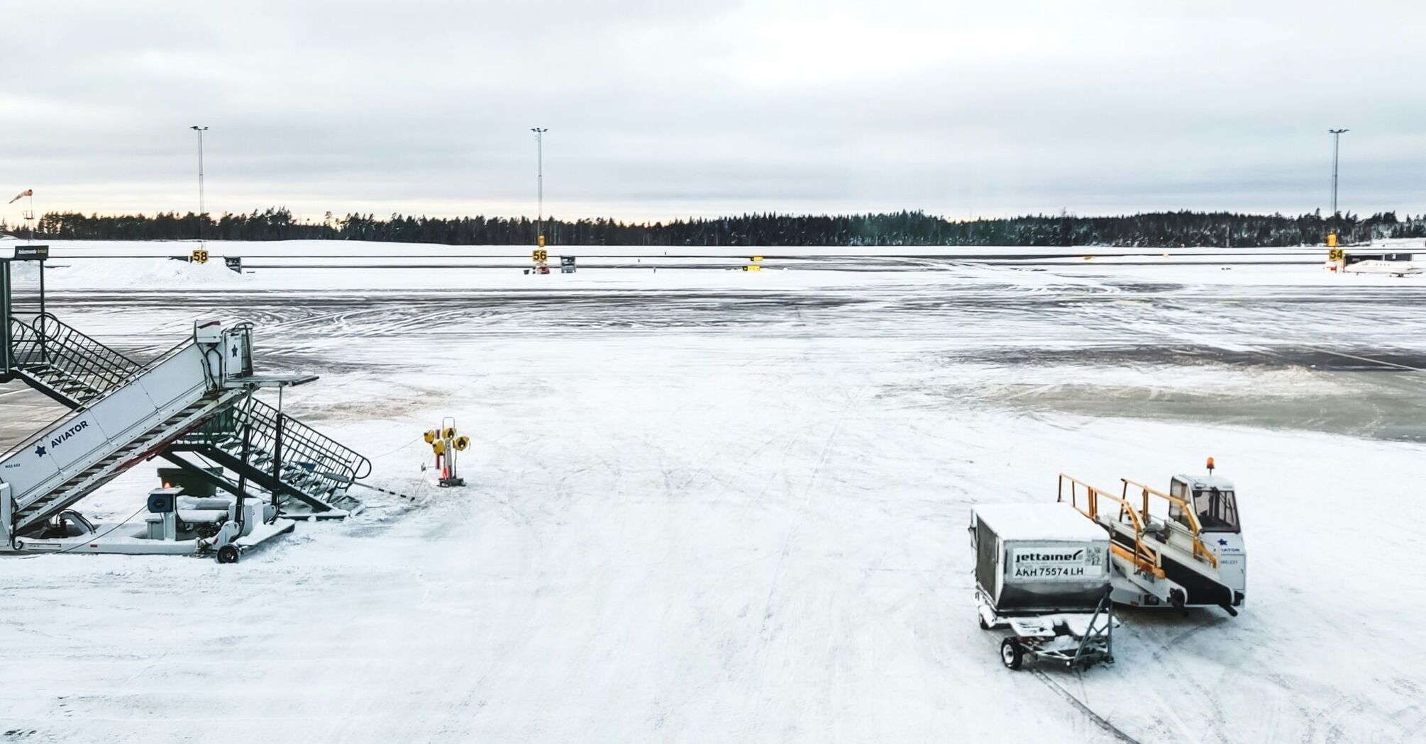 Snow-covered airport apron during cold weather operations