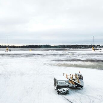 Snow-covered airport apron during cold weather operations
