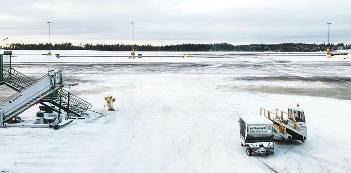 Snow-covered airport apron during cold weather operations