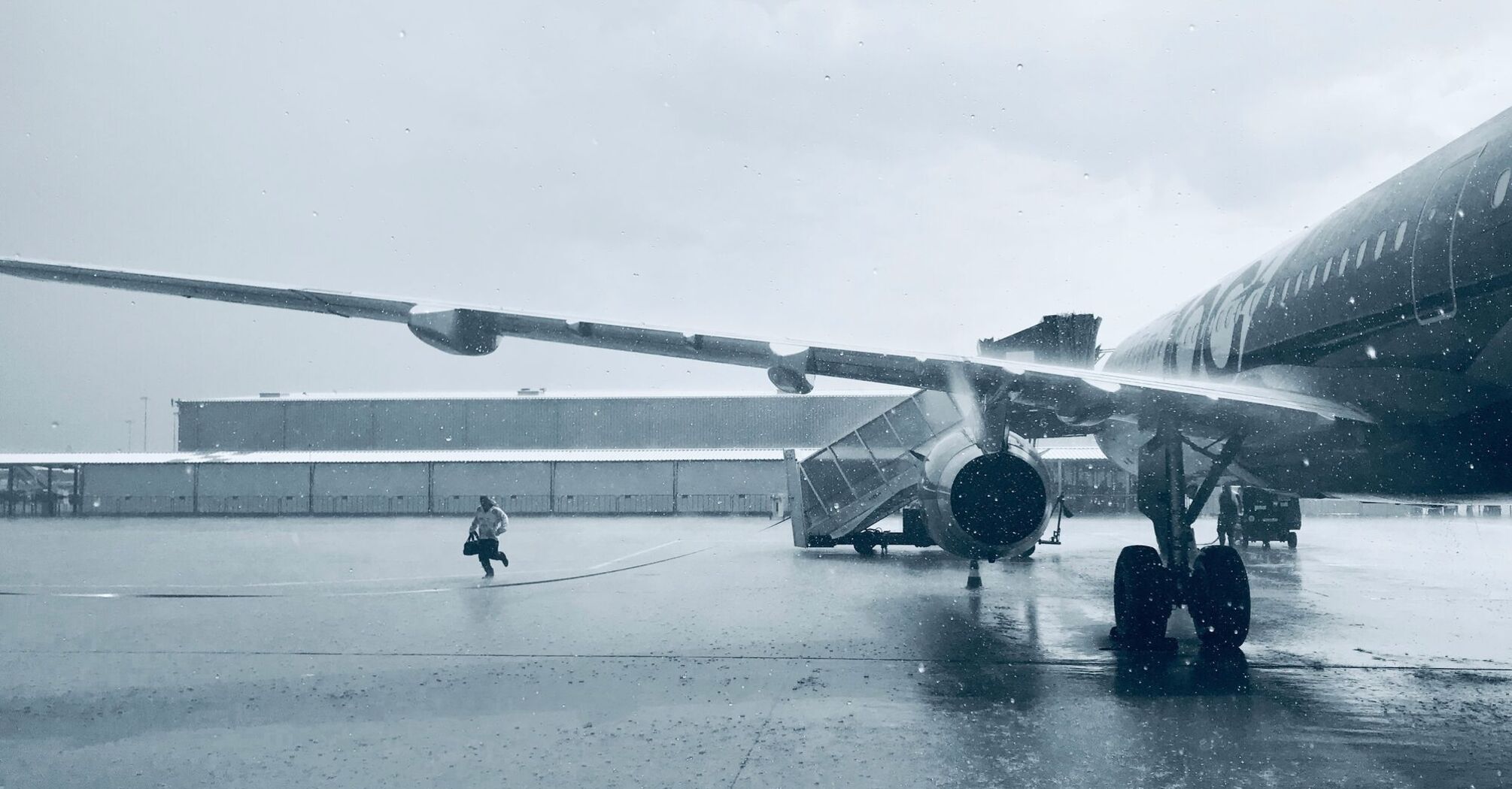 Aircraft on a snowy apron during winter weather disruption