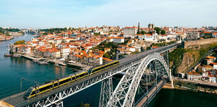 Metro train crossing Porto’s Dom Luís Bridge