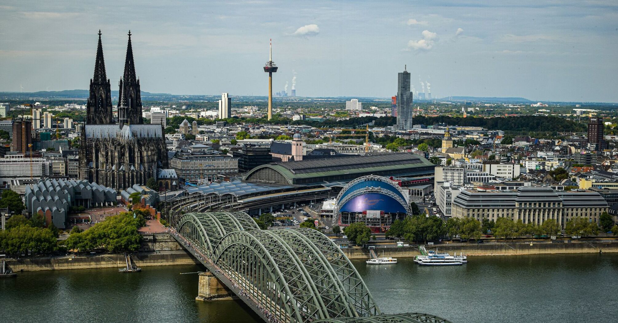 Cologne Cathedral and Hohenzollern Bridge over Rhine