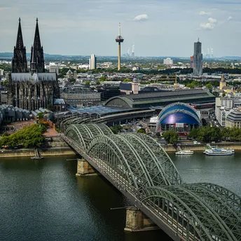 Cologne Cathedral and Hohenzollern Bridge over Rhine