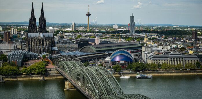Cologne Cathedral and Hohenzollern Bridge over Rhine