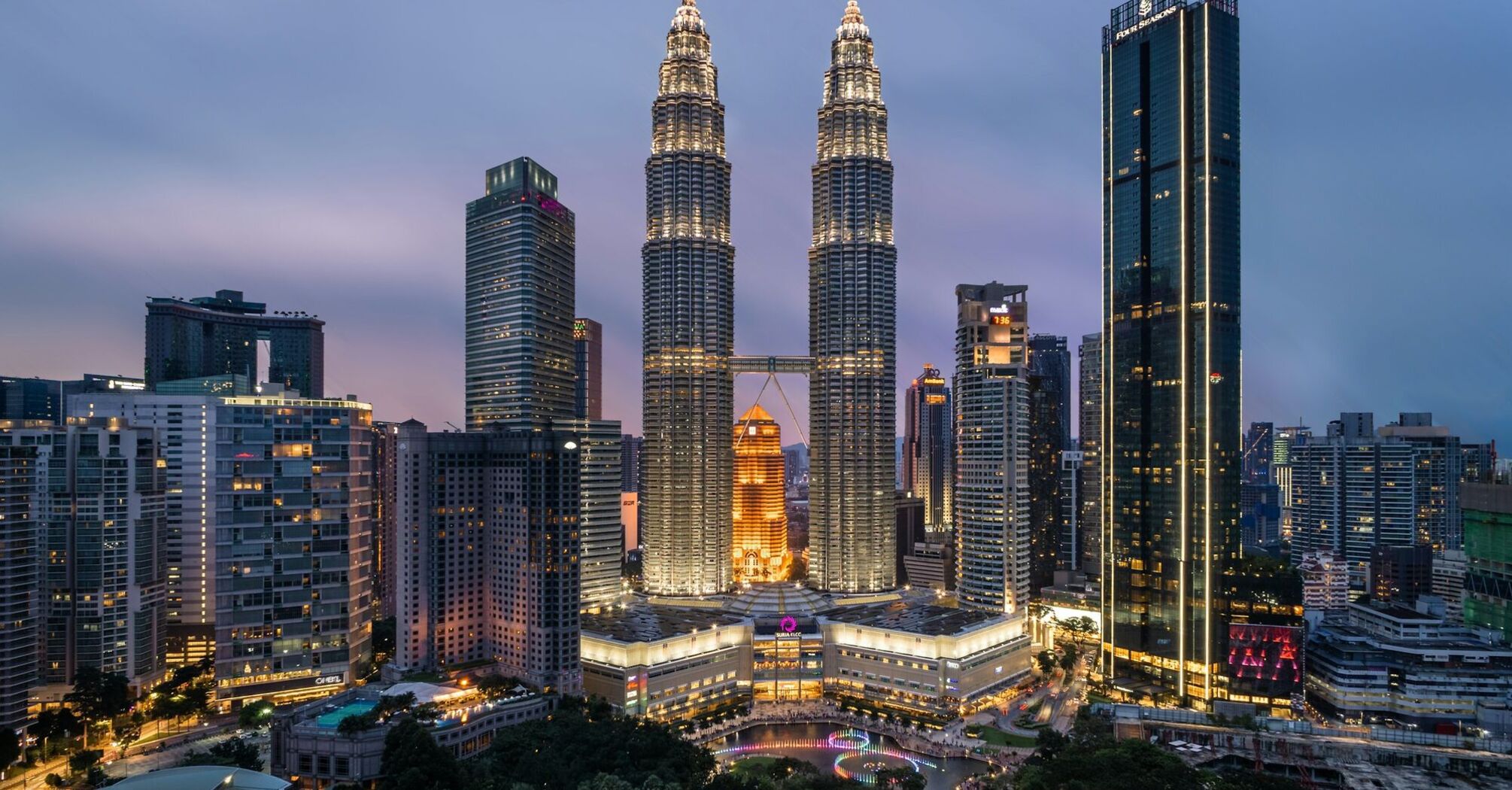 Petronas Twin Towers and Kuala Lumpur skyline at dusk