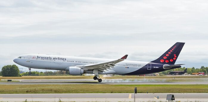 Brussels Airlines aircraft landing on a runway