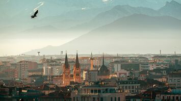 Turin skyline with the snow-covered Alps in the background