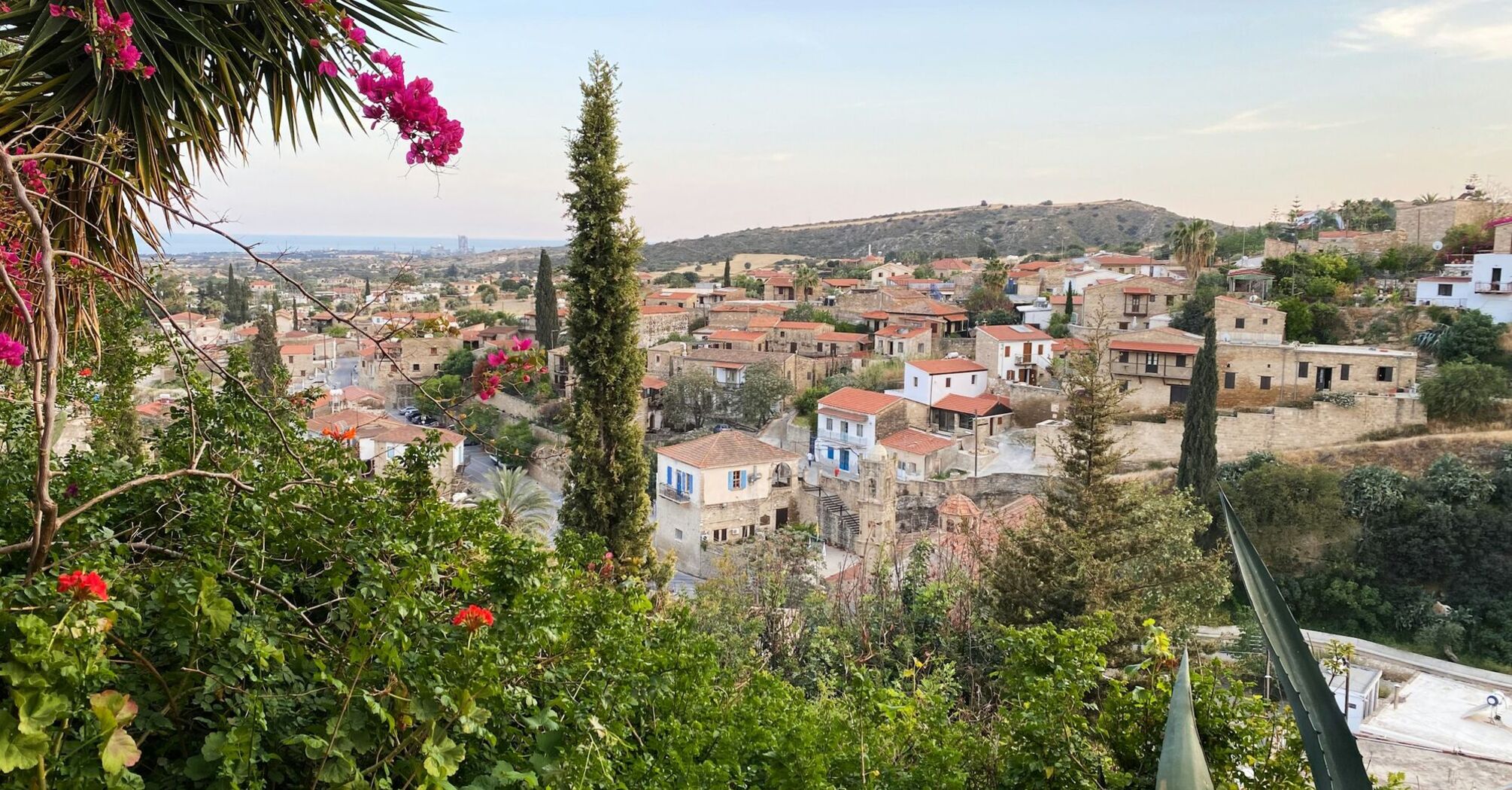 Traditional Cypriot village with stone houses and red-tiled roofs