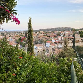 Traditional Cypriot village with stone houses and red-tiled roofs
