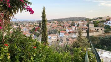 Traditional Cypriot village with stone houses and red-tiled roofs