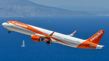 easyJet aircraft flying over the sea