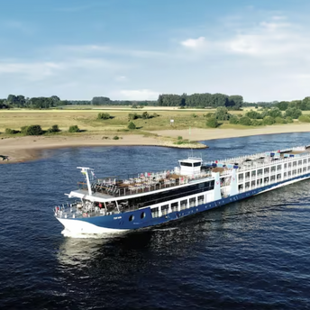 TUI river cruise ship sailing along a river