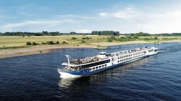 TUI river cruise ship sailing along a river