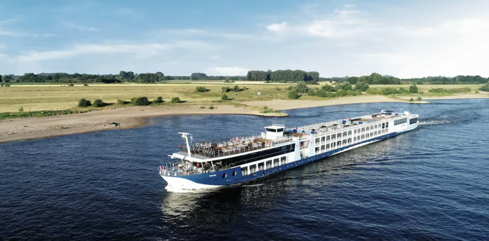 TUI river cruise ship sailing along a river