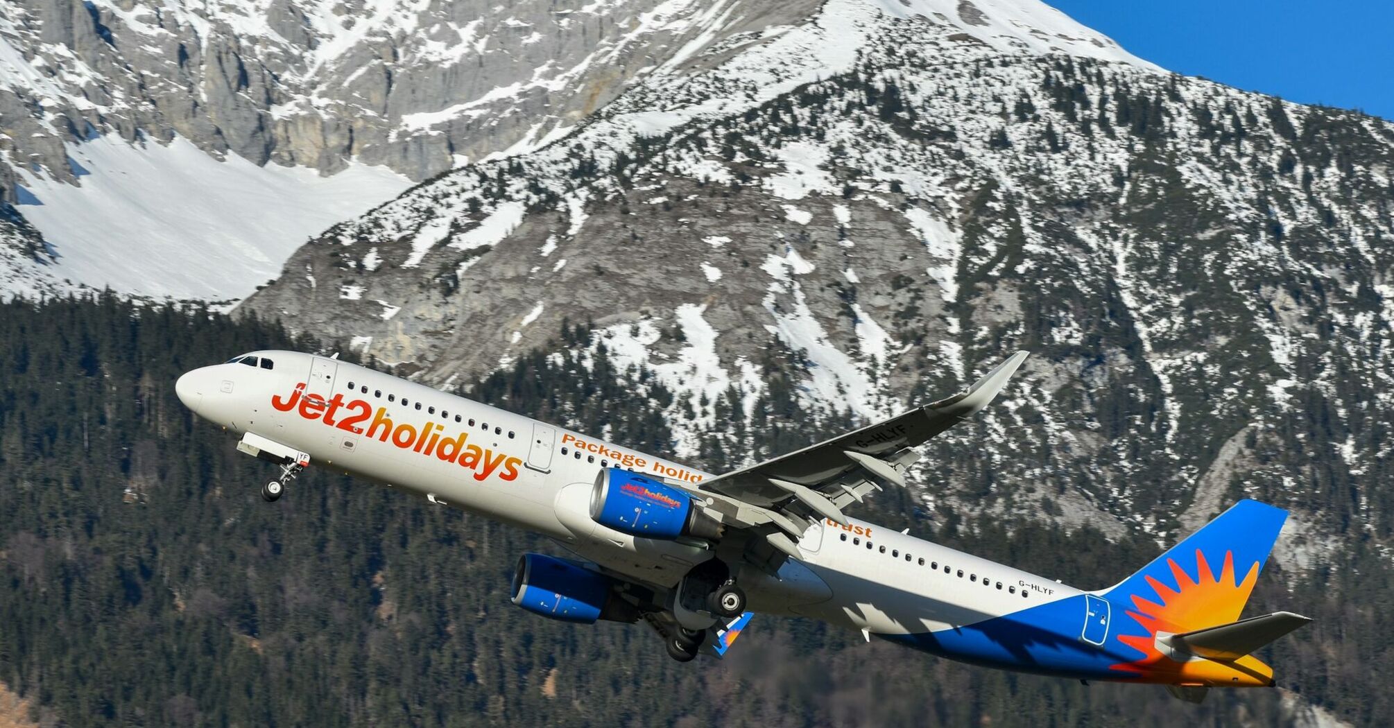 Jet2 aircraft taking off above the sea