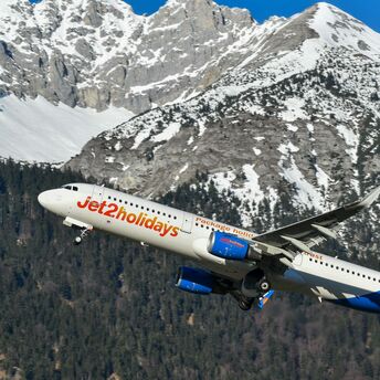 Jet2 aircraft taking off above the sea