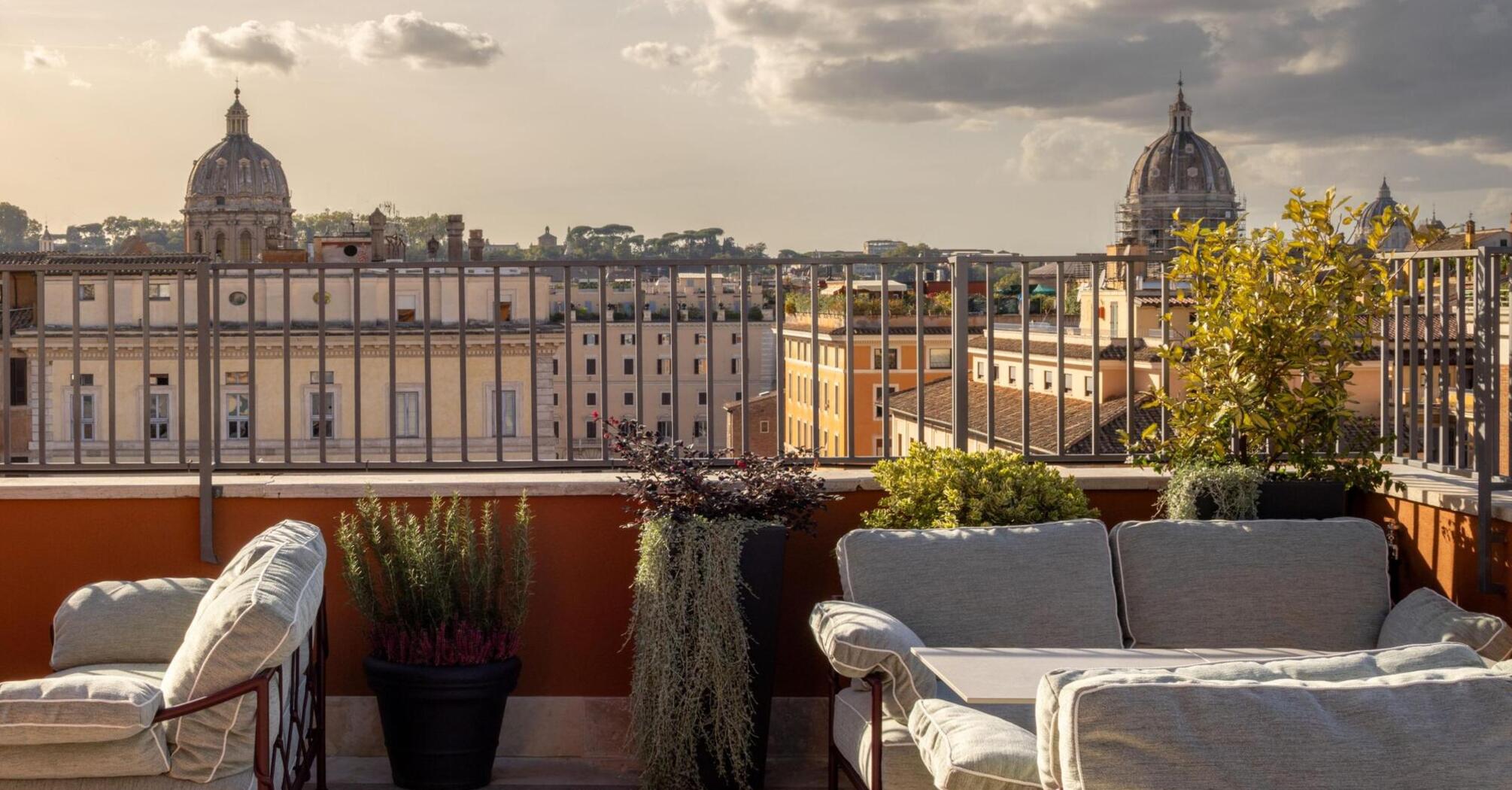 Terrace seating overlooking Rome’s rooftops at Thompson Rome