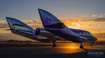 Virgin Galactic's Spaceship Apeiron parked on the tarmac at sunset