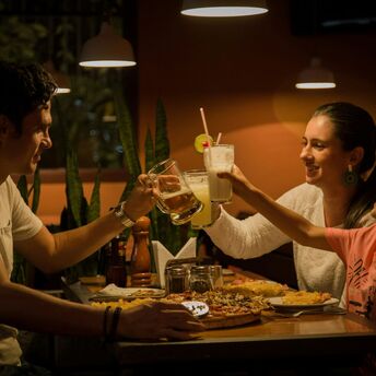 Family enjoying dinner together at a restaurant