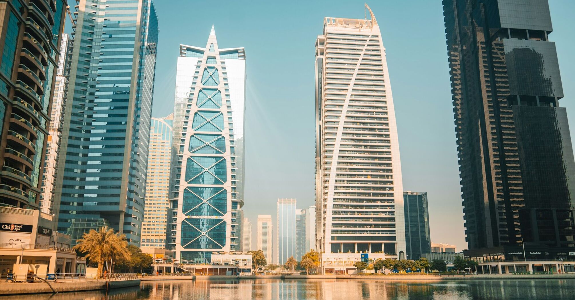 Modern skyscrapers overlooking a waterfront in Dubai
