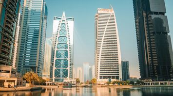 Modern skyscrapers overlooking a waterfront in Dubai