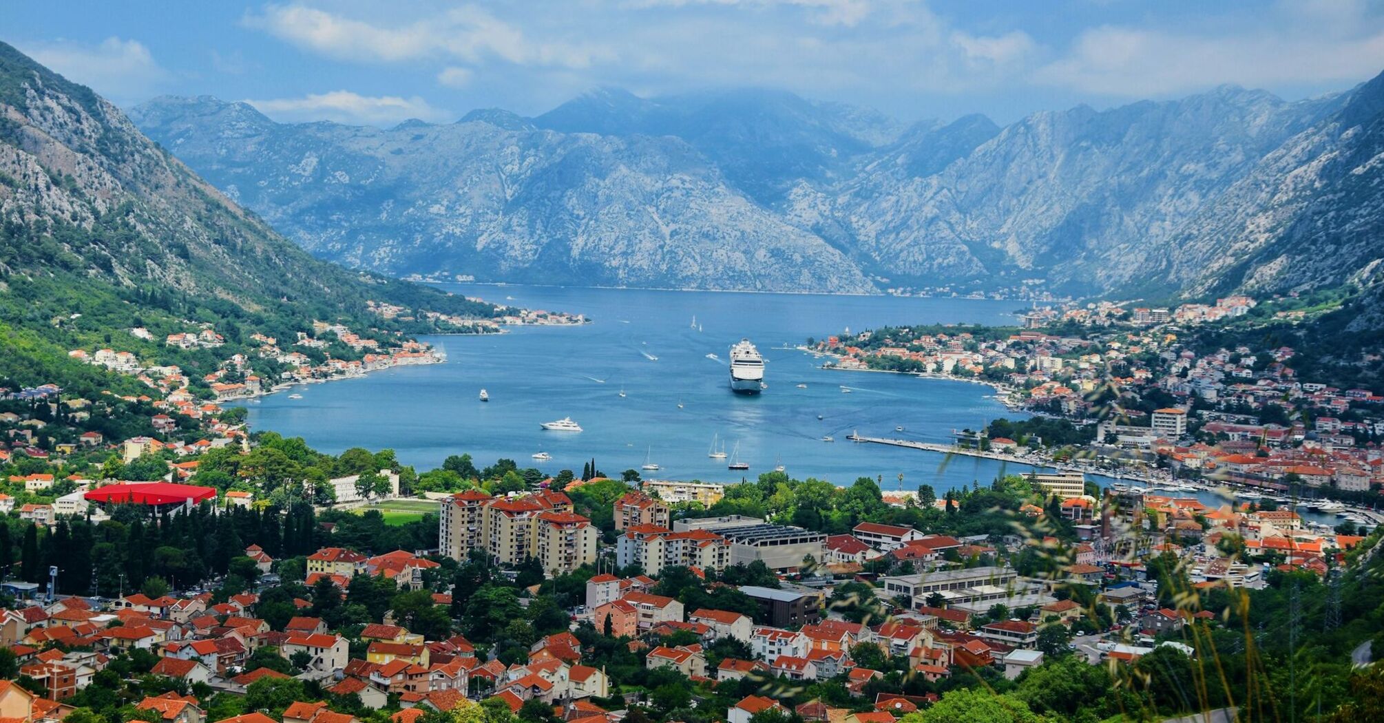 Panoramic view of the Bay of Kotor surrounded by mountains in Montenegro