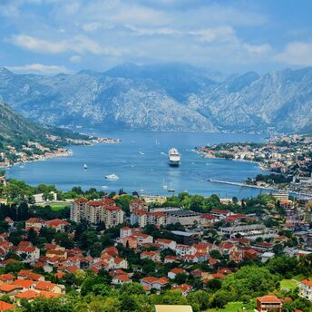 Panoramic view of the Bay of Kotor surrounded by mountains in Montenegro