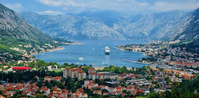 Panoramic view of the Bay of Kotor surrounded by mountains in Montenegro