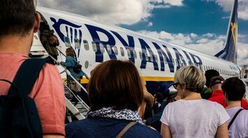 Passengers boarding a Ryanair aircraft