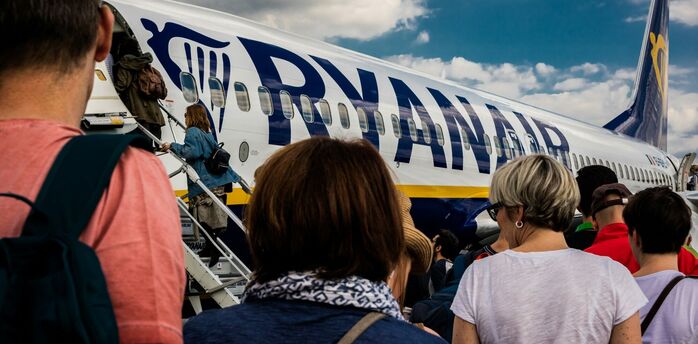 Passengers boarding a Ryanair aircraft