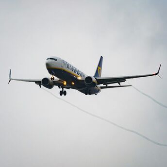 Ryanair passenger aircraft approaching landing with its landing gear extended