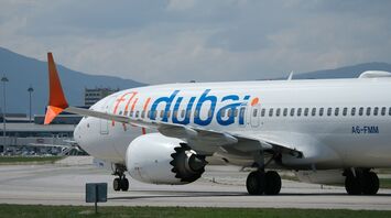 Flydubai aircraft taxiing at an airport