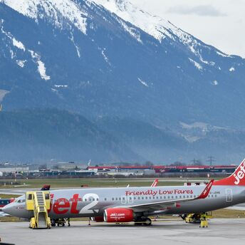 Jet2 plane with snowy mountains behind