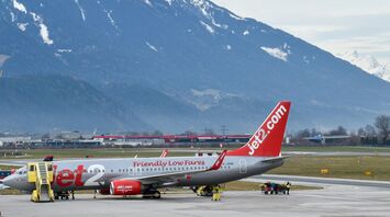 Jet2 plane with snowy mountains behind