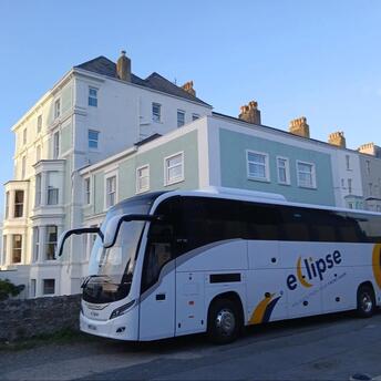 Eclipse Breaks coach on a UK street