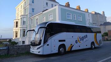 Eclipse Breaks coach on a UK street
