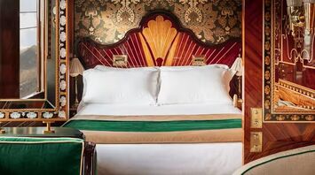 Ornate bedroom aboard the luxury train