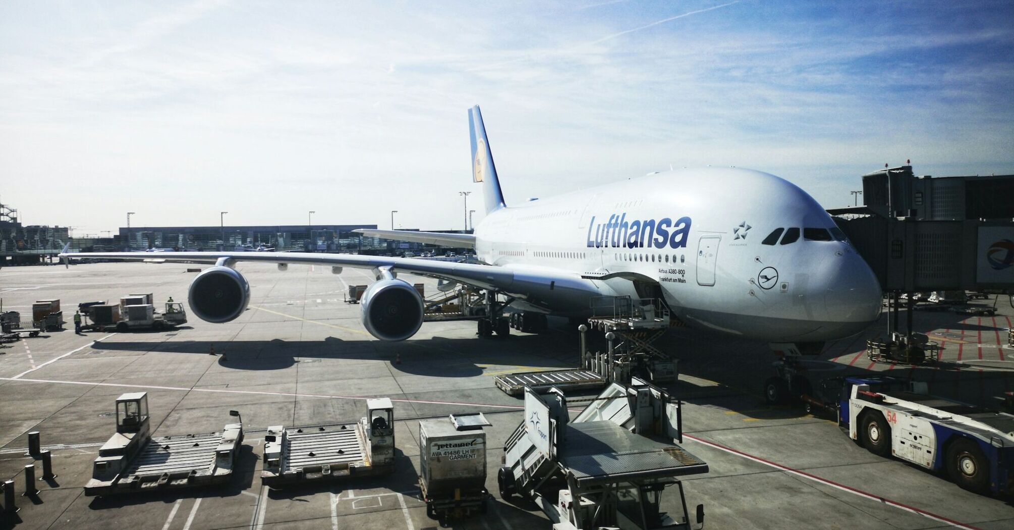 Lufthansa Airbus A380 parked at airport gate