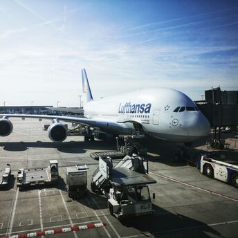 Lufthansa Airbus A380 parked at airport gate