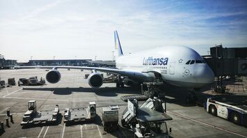 Lufthansa Airbus A380 parked at airport gate