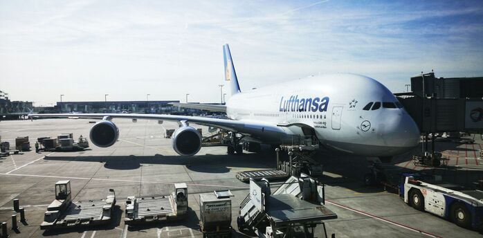 Lufthansa Airbus A380 parked at airport gate