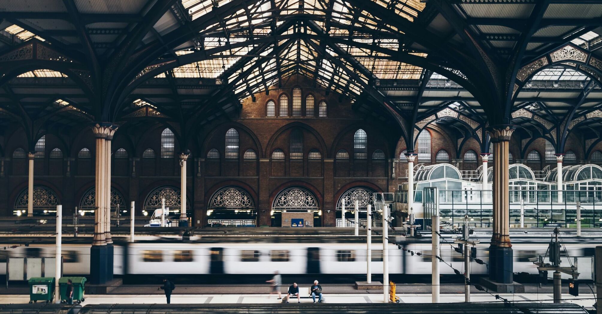 Interior of London Liverpool Street Station with platforms and trains