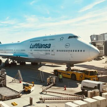 Lufthansa Boeing 787-9 parked at Frankfurt Airport gate