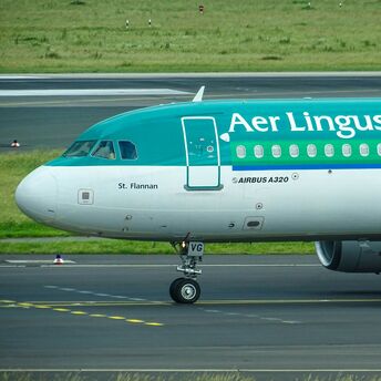 Aer Lingus Airbus A320 taxiing on runway at the airport