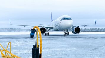Commercial aircraft on icy runway during winter operations