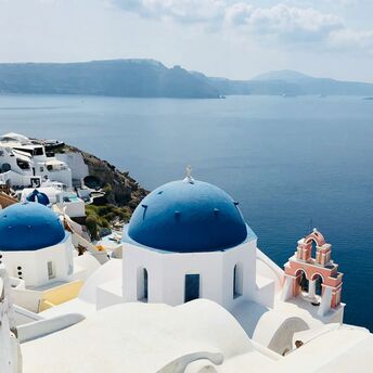 Santorini caldera with blue-domed churches