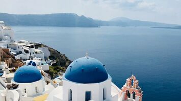 Santorini caldera with blue-domed churches