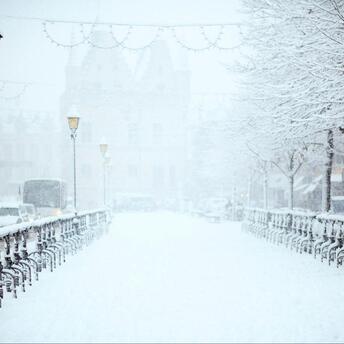 Snow covered street during winter storm